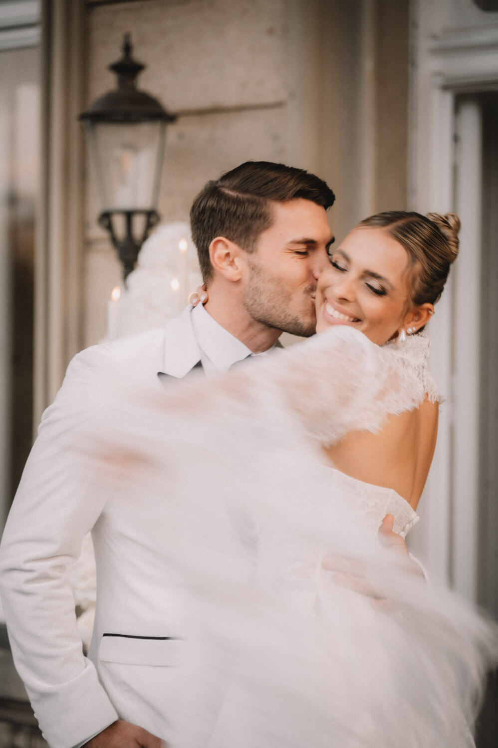 Intimate wedding portrait of a couple sharing a quiet moment in soft light