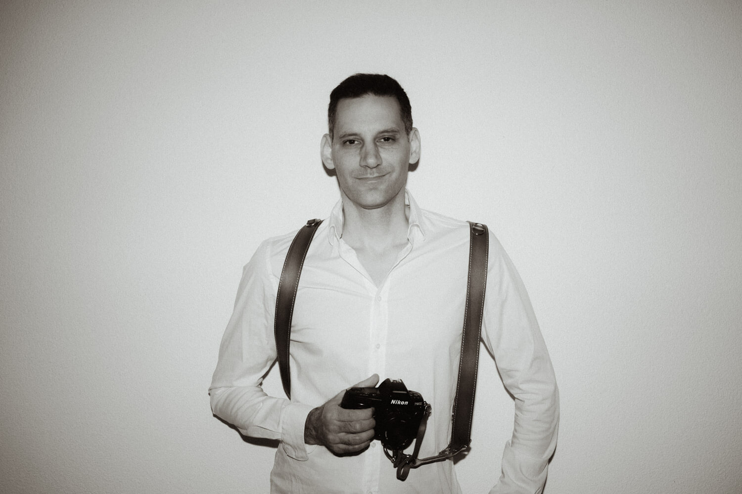 Portrait of a wedding photographer in black and white